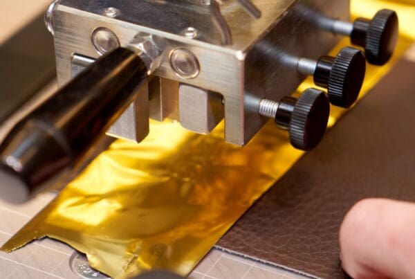 Using a hot foil stamping machine as part of process