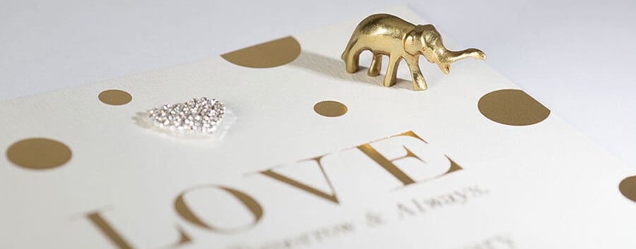 hot foil printed gold card with small gold elephant
