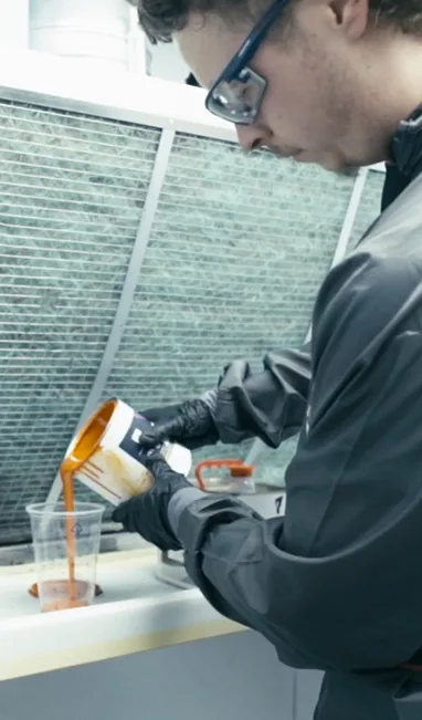 Spray painting a hot foil press body